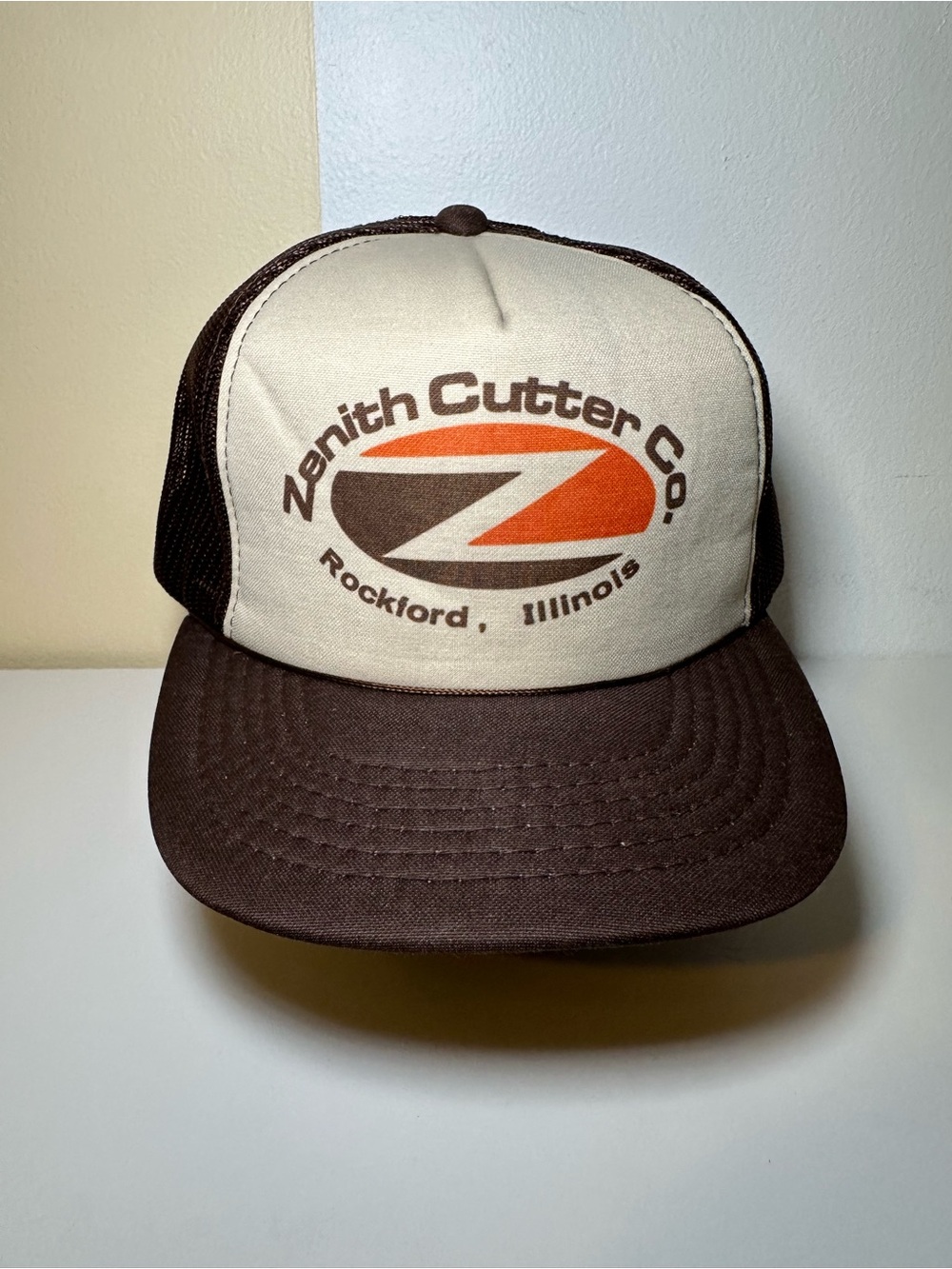 Zenith Cutter Co. Brown and Cream Trucker Hat with Orange Logo